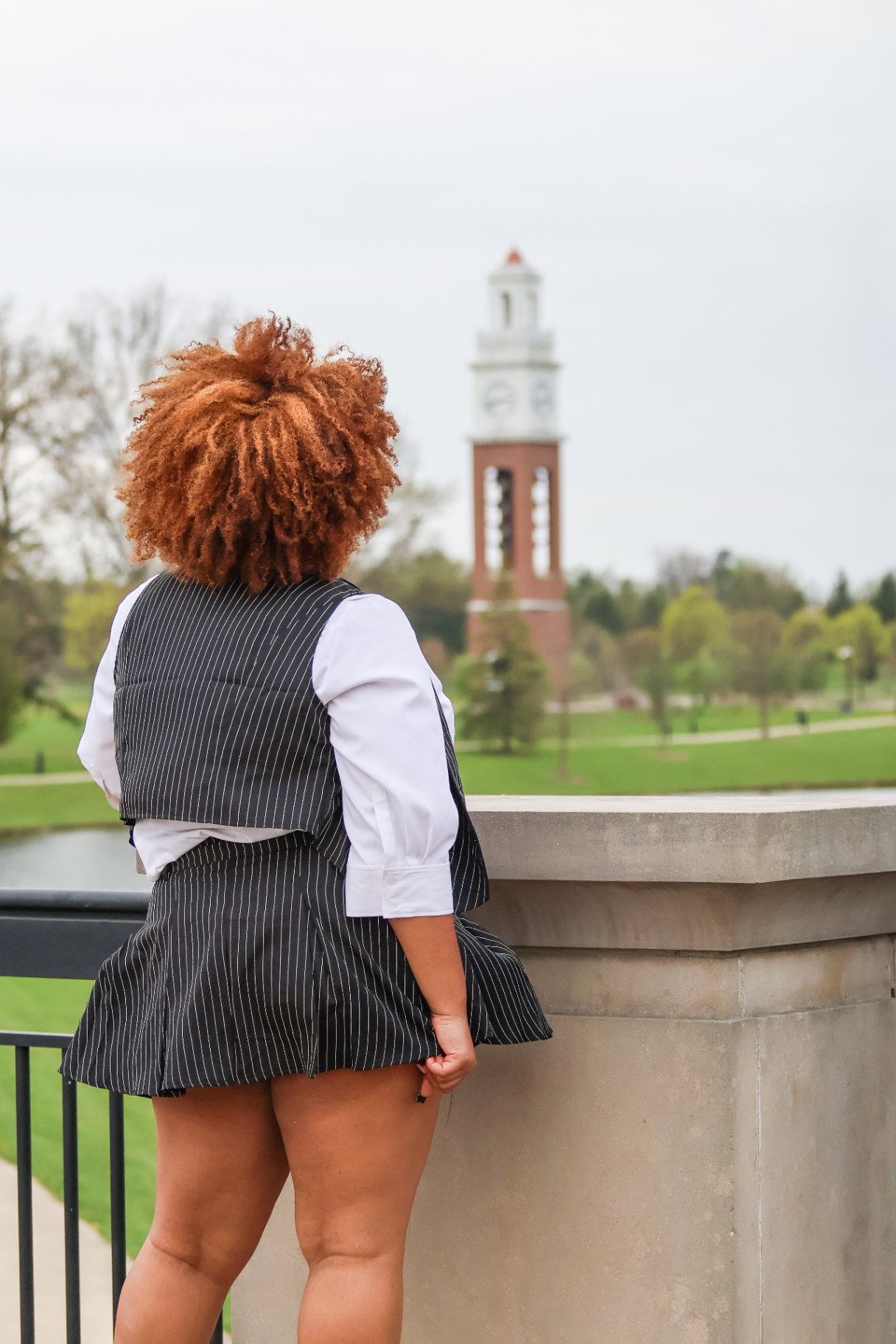 Senior at bell tower