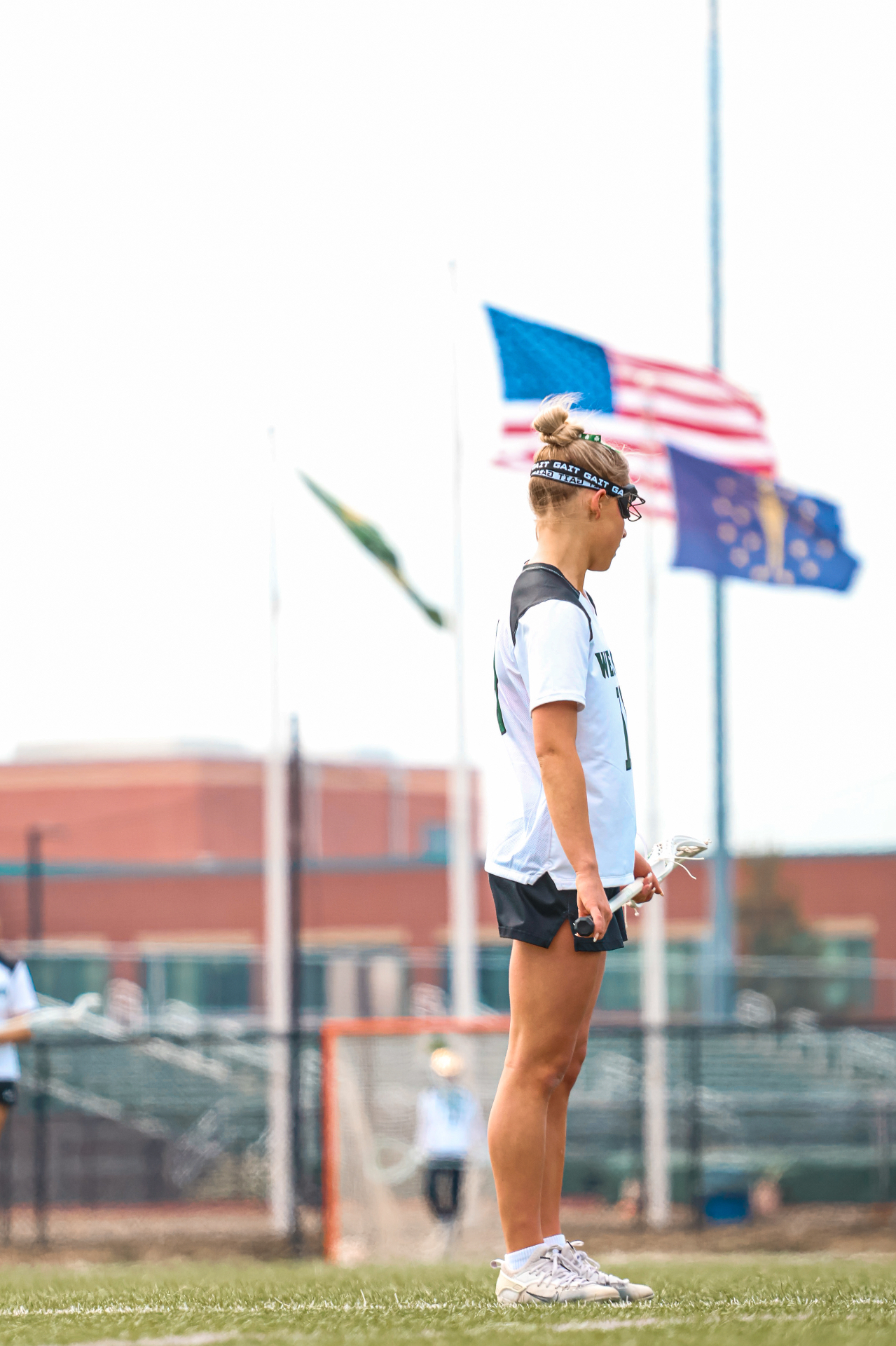 Lacrosse player with flags