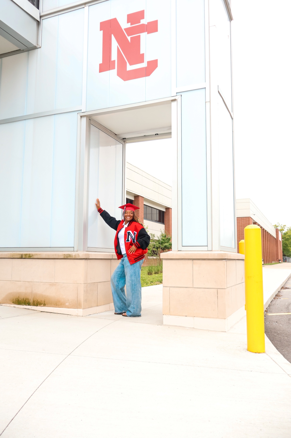 Senior in letterman jacket at NC entrance